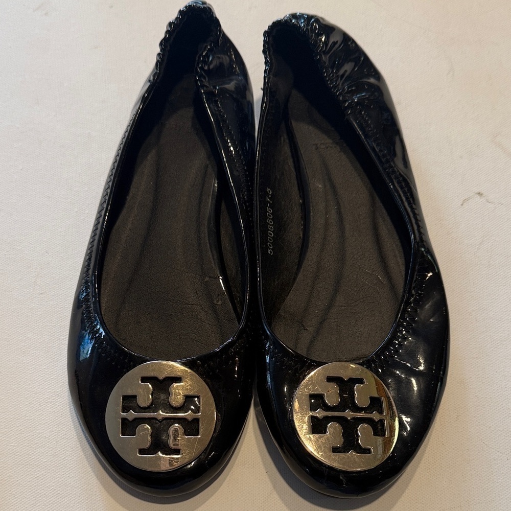 Tory Burch Shiny Black Flats with Gold Logo